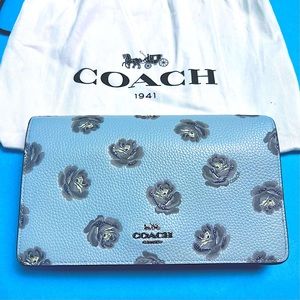 Coach sky blue glitter flower crossbody bag.